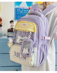 Detailed view of the cute Japanese style student backpack with clear pocket and plush pendant.