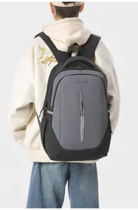 Close-up of the stylish black and grey casual backpack detail showing the front zipper.