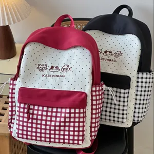 Japanese style cute plaid and polka dot backpack with cat embroidery for students and girls.