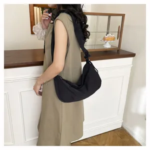 Casual nylon black shoulder dumpling bag model detail showcasing versatile daily commuting style.