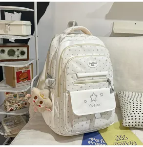 Sac à dos d'école style doux japonais avec motif d'étoiles, sac de jour décontracté et pratique.