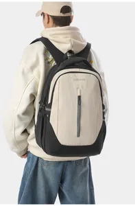 Detailed view of casual travel backpack worn on back, showing dual shoulder straps and front pocket.
