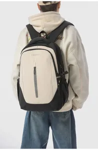 Lightweight casual backpack for men and women, large capacity computer school travel bag.