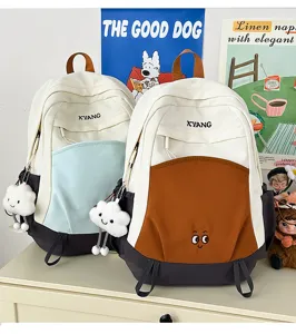 Large capacity color-block canvas backpack for students, casual stylish school book bag.