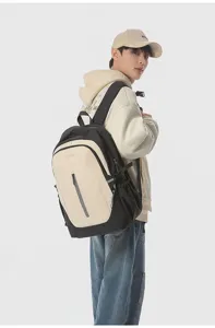 Stylish casual backpack worn by a model, showcasing daily commuting and travel style details.