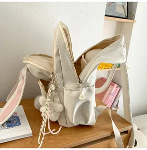 Beige bunny ears backpack detail, cute student schoolbag interior structure display