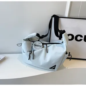 Casual nylon crossbody bag for men and women, stylish commuter messenger shoulder bag with pouch.