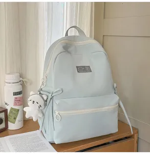 Lichtblauwe casual rugzak met grote capaciteit, ideaal voor studenten en schoolgebruik.