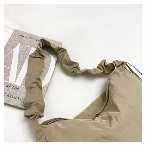 Casual nylon pleated crossbody shoulder bag large capacity commuting dumpling bag detail view