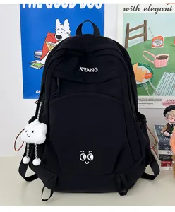 Black canvas casual backpack with cute cloud pendant and roomy student compartments for daily use.