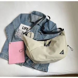 Casual canvas crossbody messenger bag for men and women, streetwear stylish shoulder bag with strap.
