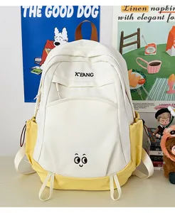 Large capacity color-blocked canvas school backpack for students, casual travel daypack in white yellow.
