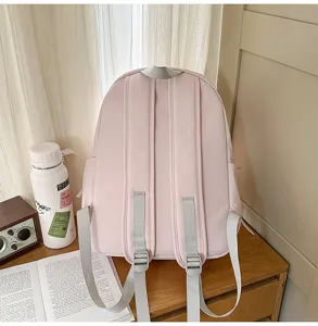Minimalistische grote roze schoolrugzak voor studenten, comfortabel en handig voor dagelijks gebruik.