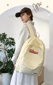 Canvas backpack college style casual lightweight school bag simple commuting daypack for women.