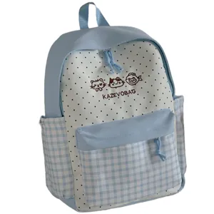Cute Japanese style school backpack for girls with polka dot and plaid design, perfect daily bag.