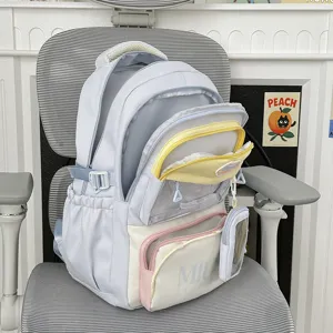 Japanese style cute school backpack for women, casual multi-pocket college bookbag for daily use.