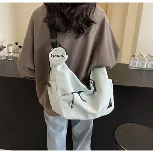 Casual streetwear crossbody bag for men and women, stylish commuter messenger bag with pouch.