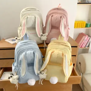 Cute bunny ear backpack for school girls, sweet pastel colors, Japanese style casual daypack.