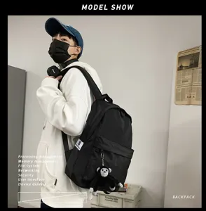 Stylish black computer backpack for men and women, large capacity casual daily school bag.