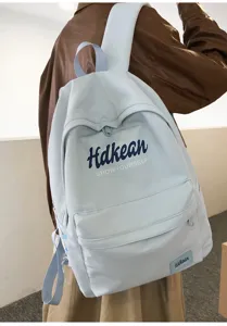 Lightweight college style blue backpack for women, casual commuter daily student bookbag.