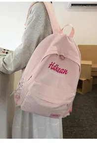 Pink college style women backpack, casual school bag and lightweight daily commuter daypack.