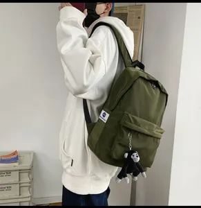Casual Japanese style solid color canvas backpack large capacity laptop school bag for students.