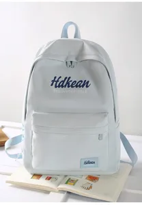 Lightweight casual backpack for college and daily commute in stylish light grey color.