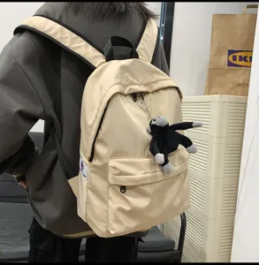 Minimalist casual school backpack for college students, large capacity computer travel bag.