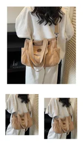 Corduroy tote bag detail showing dual handles, side pocket, and adjustable shoulder strap.