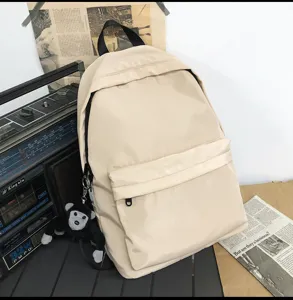 Simple daily nylon backpack for women and men, large capacity travel school bag.
