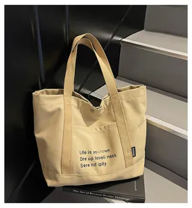 Stylish canvas tote bag for women, large capacity casual shoulder bag for daily commute and school.