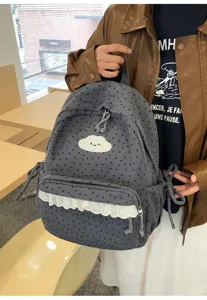 Japanese style cute corduroy backpack for women and students with lovely cloud embroidery.