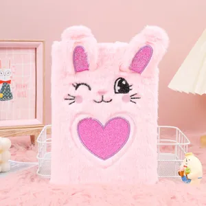Cute pink fluffy notebook with cute bunny ears and sparkly heart embroidery for students daily use.