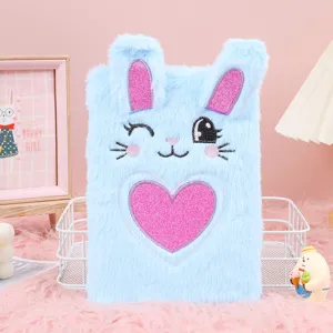 Cute blue plush bunny notebook with glitter heart embroidery for student journal use.