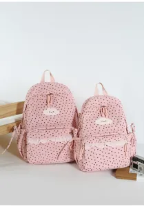 Sweet polka dot backpack for school girls, pink cute student book bag with lace and cloud patch.