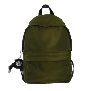 Casual green backpack with cute monkey pendant, large capacity school bag for daily use.