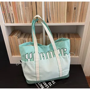 Borsa shopper in tela casual da donna, grande borsa a spalla elegante per viaggio quotidiano.