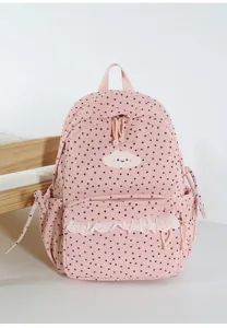 Details of sweet pink corduroy backpack with star pattern and cute embroidered cloud accent.