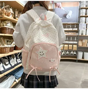 Zaino scolastico in stile giapponese per studenti, design a pois con ricamo di stelle.