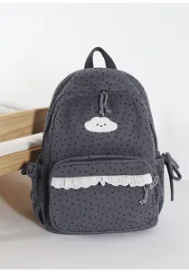 Detailed view of sweet Japanese style dark grey corduroy backpack with cute cloud embroidery.