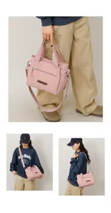 Pink nylon casual crossbody bag for women, featuring spacious interior and sturdy straps.