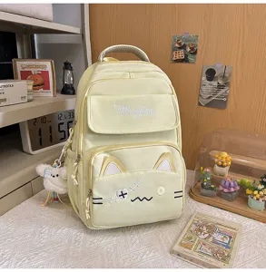 Cute Japanese style canvas backpack with cat ears embroidery, casual school bag for women.