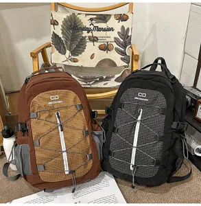 Casual outdoor backpack detail shot, large capacity mountaineering bag with cord design.
