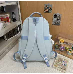 Casual light blue school backpack for students, stylish daily travel lightweight daypack bag.