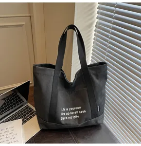 Korean style black canvas tote bag for women, large capacity daily commuting shoulder bag.