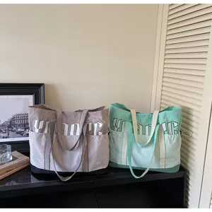 Grande borsa shopper in tela da donna, elegante borsa a spalla color block per uso quotidiano.