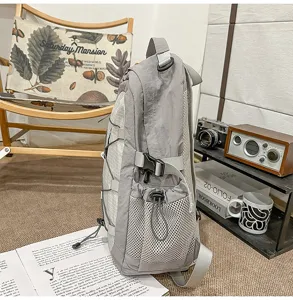 Casual grey backpack with large capacity, ideal for hiking, sports, school, and travel use.
