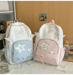 Zaino scolastico a pois in stile giapponese con ricamo di stelle e ali per l'uso quotidiano.