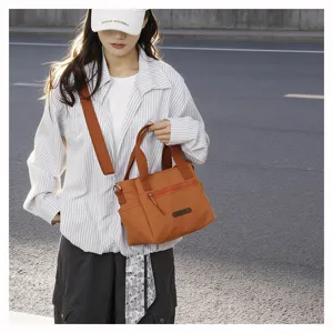 Casual women nylon shoulder crossbody bag, lightweight tote for daily commute and travel.