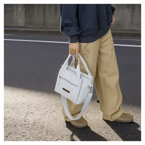 Detailed view of casual nylon crossbody bag, lightweight daily shoulder tote for women.